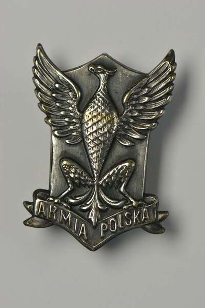 Orzełek z czapek ochotników z Ameryki do Armii Polskiej we Francji (zasób IPN)